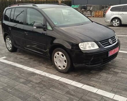 Чорний Фольксваген Туран, об'ємом двигуна 1.6 л та пробігом 167 тис. км за 4999 $, фото 1 на Automoto.ua