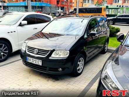 Фольксваген Туран 2005 в Павлограде на Automoto.ua Черный Фольксваген Туран, объемом двигателя 2 л и пробегом 190 тыс. км за 6600 $, фото 1 на Automoto.ua