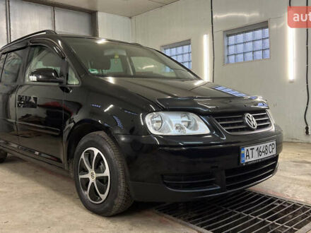 Черный Фольксваген Туран, объемом двигателя 1.9 л и пробегом 419 тыс. км за 5900 $, фото 1 на Automoto.ua