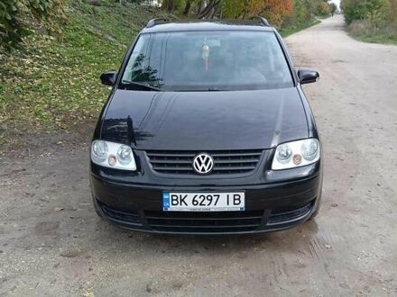 Фольксваген Туран 2006 в Кременце на Automoto.ua Черный Фольксваген Туран, объемом двигателя 1.6 л и пробегом 240 тыс. км за 5700 $, фото 1 на Automoto.ua