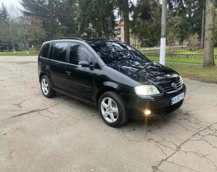 Черный Фольксваген Туран, объемом двигателя 1.9 л и пробегом 290 тыс. км за 6500 $, фото 1 на Automoto.ua
