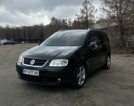 Черный Фольксваген Туран, объемом двигателя 1.4 л и пробегом 272 тыс. км за 4500 $, фото 1 на Automoto.ua