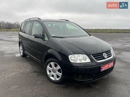 Чорний Фольксваген Туран, об'ємом двигуна 1.6 л та пробігом 205 тис. км за 6500 $, фото 1 на Automoto.ua