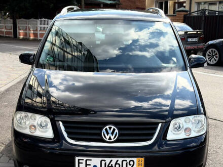 Черный Фольксваген Туран, объемом двигателя 1.6 л и пробегом 190 тыс. км за 6999 $, фото 1 на Automoto.ua