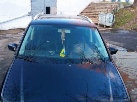 Черный Фольксваген Туран, объемом двигателя 2 л и пробегом 280 тыс. км за 5300 $, фото 1 на Automoto.ua