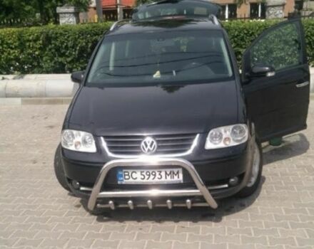 Черный Фольксваген Туран, объемом двигателя 2 л и пробегом 290 тыс. км за 5900 $, фото 1 на Automoto.ua