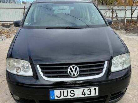 Черный Фольксваген Туран, объемом двигателя 1.9 л и пробегом 430 тыс. км за 2500 $, фото 1 на Automoto.ua