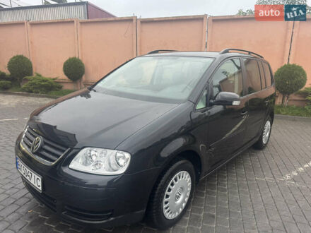 Фольксваген Туран 2006 в Хмельницком на Automoto.ua Черный Фольксваген Туран, объемом двигателя 1.9 л и пробегом 246 тыс. км за 7800 $, фото 1 на Automoto.ua