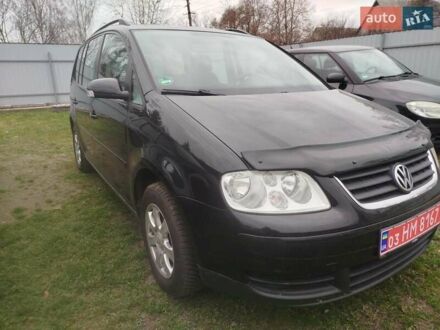Черный Фольксваген Туран, объемом двигателя 1.6 л и пробегом 225 тыс. км за 6000 $, фото 1 на Automoto.ua