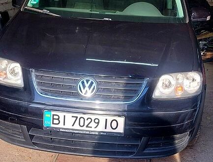 Чорний Фольксваген Туран, об'ємом двигуна 1.6 л та пробігом 234 тис. км за 6000 $, фото 1 на Automoto.ua