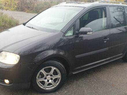 Черный Фольксваген Туран, объемом двигателя 1.9 л и пробегом 333 тыс. км за 3300 $, фото 1 на Automoto.ua