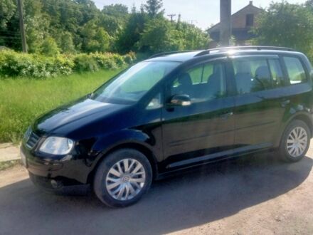 Фольксваген Туран 2006 в Могилев-Подольском на Automoto.ua Черный Фольксваген Туран, объемом двигателя 1.6 л и пробегом 241 тыс. км за 6000 $, фото 1 на Automoto.ua