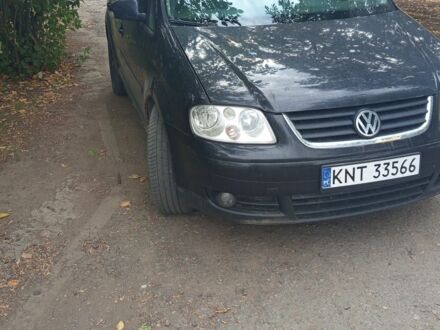 Черный Фольксваген Туран, объемом двигателя 2 л и пробегом 600 тыс. км за 3000 $, фото 1 на Automoto.ua