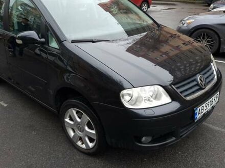 Черный Фольксваген Туран, объемом двигателя 1.39 л и пробегом 239 тыс. км за 5700 $, фото 1 на Automoto.ua