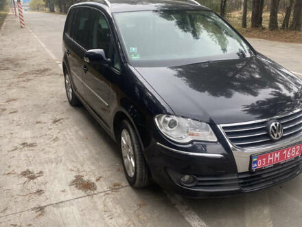 Черный Фольксваген Туран, объемом двигателя 1.39 л и пробегом 187 тыс. км за 6500 $, фото 1 на Automoto.ua