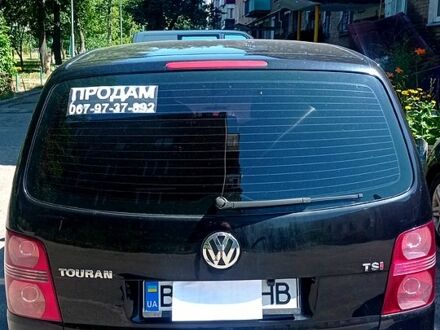 Фольксваген Туран 2007 в Черкассах на Automoto.ua Черный Фольксваген Туран, объемом двигателя 1.4 л и пробегом 233 тыс. км за 6800 $, фото 1 на Automoto.ua
