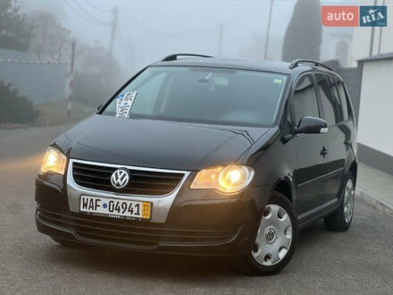 Чорний Фольксваген Туран, об'ємом двигуна 1.4 л та пробігом 249 тис. км за 6999 $, фото 1 на Automoto.ua