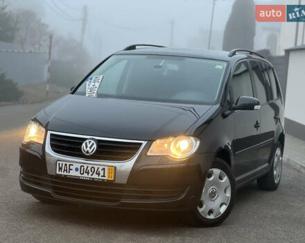 Черный Фольксваген Туран, объемом двигателя 1.4 л и пробегом 249 тыс. км за 6999 $, фото 1 на Automoto.ua