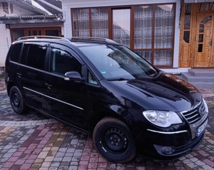 Черный Фольксваген Туран, объемом двигателя 2 л и пробегом 320 тыс. км за 6800 $, фото 1 на Automoto.ua