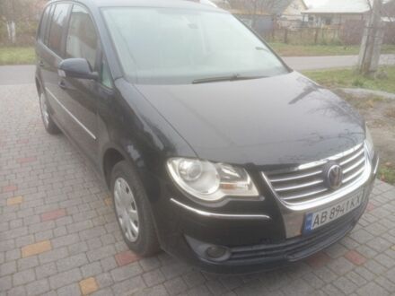 Чорний Фольксваген Туран, об'ємом двигуна 1.4 л та пробігом 268 тис. км за 5600 $, фото 1 на Automoto.ua