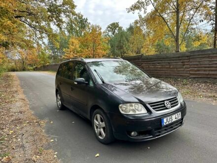 Черный Фольксваген Туран, объемом двигателя 1.9 л и пробегом 244 тыс. км за 1650 $, фото 1 на Automoto.ua