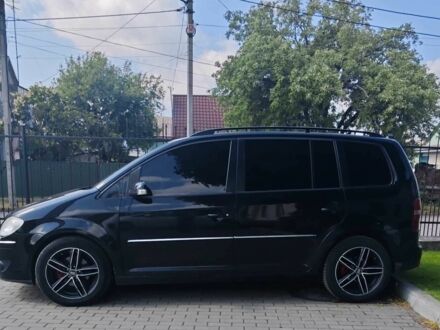 Фольксваген Туран 2007 в Луцке на Automoto.ua Черный Фольксваген Туран, объемом двигателя 2 л и пробегом 310 тыс. км за 8000 $, фото 1 на Automoto.ua