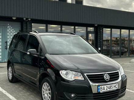 Фольксваген Туран 2007 у Вознесенске на Automoto.ua Чорний Фольксваген Туран, об'ємом двигуна 1.9 л та пробігом 124 тис. км за 8700 $, фото 1 на Automoto.ua