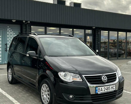 Черный Фольксваген Туран, объемом двигателя 1.9 л и пробегом 124 тыс. км за 8700 $, фото 1 на Automoto.ua