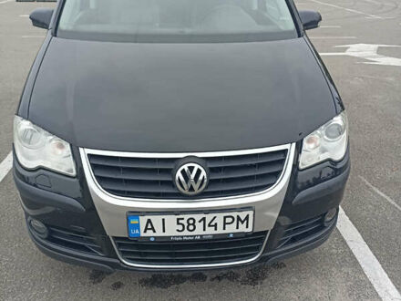 Фольксваген Туран 2007 у Києві на Automoto.ua Чорний Фольксваген Туран, об'ємом двигуна 1.39 л та пробігом 250 тис. км за 5700 $, фото 1 на Automoto.ua