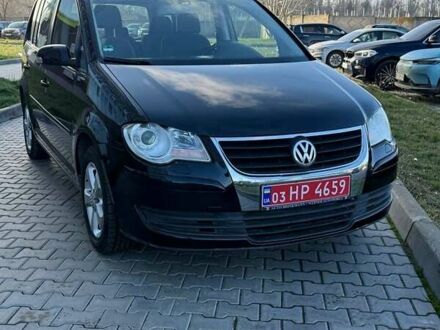 Чорний Фольксваген Туран, об'ємом двигуна 1.6 л та пробігом 178 тис. км за 7950 $, фото 1 на Automoto.ua