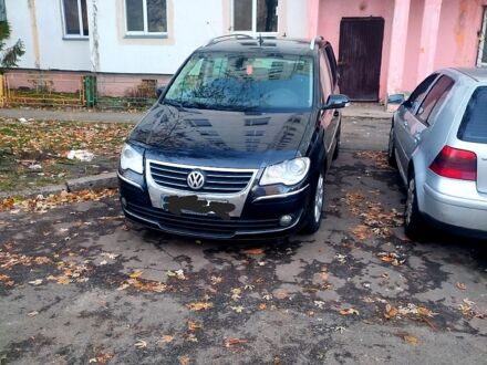 Фольксваген Туран 2007 у Києві на Automoto.ua Чорний Фольксваген Туран, об'ємом двигуна 2 л та пробігом 250 тис. км за 6500 $, фото 1 на Automoto.ua