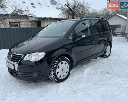 Черный Фольксваген Туран, объемом двигателя 2 л и пробегом 252 тыс. км за 6800 $, фото 1 на Automoto.ua