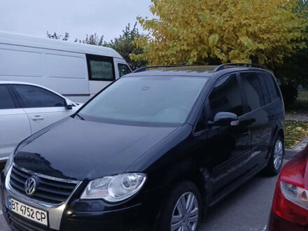 Фольксваген Туран 2007 в Софіївська Борщагівка на Automoto.ua Черный Фольксваген Туран, объемом двигателя 1.97 л и пробегом 163 тыс. км за 7800 $, фото 1 на Automoto.ua