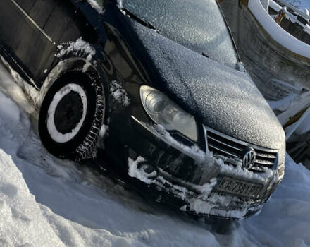 Чорний Фольксваген Туран, об'ємом двигуна 1.39 л та пробігом 244 тис. км за 5500 $, фото 1 на Automoto.ua
