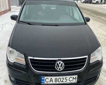 Черный Фольксваген Туран, объемом двигателя 1.9 л и пробегом 234 тыс. км за 8650 $, фото 1 на Automoto.ua