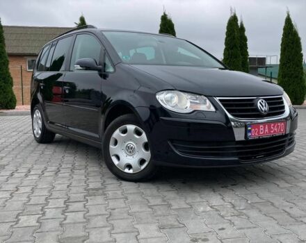 Черный Фольксваген Туран, объемом двигателя 1.4 л и пробегом 196 тыс. км за 6650 $, фото 1 на Automoto.ua