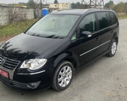 Черный Фольксваген Туран, объемом двигателя 1.4 л и пробегом 178 тыс. км за 5999 $, фото 1 на Automoto.ua