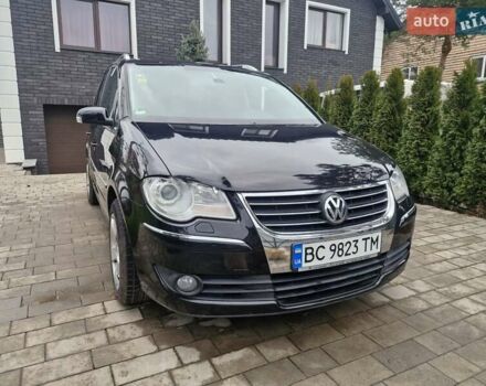 Чорний Фольксваген Туран, об'ємом двигуна 1.4 л та пробігом 240 тис. км за 6500 $, фото 1 на Automoto.ua