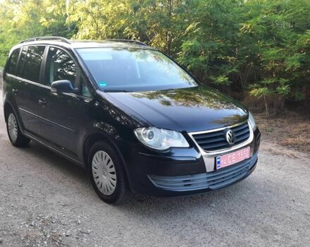 Черный Фольксваген Туран, объемом двигателя 1.6 л и пробегом 138 тыс. км за 7175 $, фото 1 на Automoto.ua