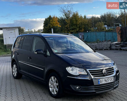Черный Фольксваген Туран, объемом двигателя 1.39 л и пробегом 250 тыс. км за 6000 $, фото 1 на Automoto.ua
