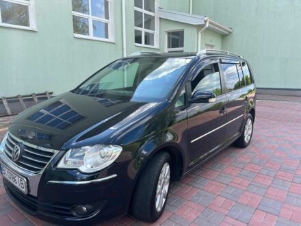 Фольксваген Туран 2007 в Полтаве на Automoto.ua Черный Фольксваген Туран, объемом двигателя 2 л и пробегом 366 тыс. км за 6400 $, фото 1 на Automoto.ua