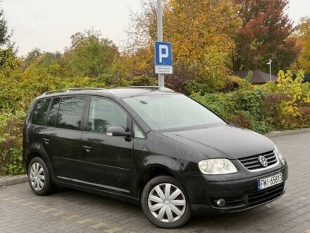 Черный Фольксваген Туран, объемом двигателя 1.9 л и пробегом 225 тыс. км за 2450 $, фото 1 на Automoto.ua