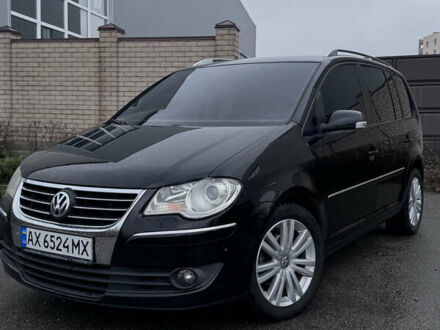 Фольксваген Туран 2007 в Харькове на Automoto.ua Черный Фольксваген Туран, объемом двигателя 2 л и пробегом 260 тыс. км за 9000 $, фото 1 на Automoto.ua
