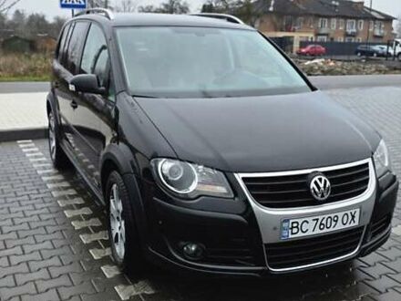 Чорний Фольксваген Туран, об'ємом двигуна 1.97 л та пробігом 240 тис. км за 7300 $, фото 1 на Automoto.ua