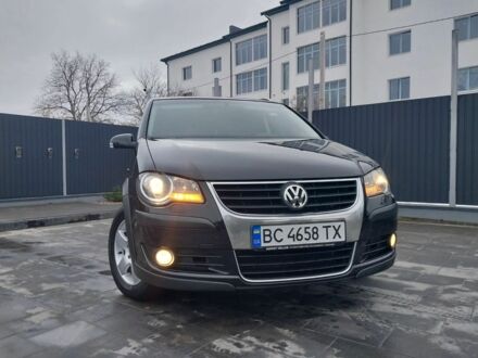 Черный Фольксваген Туран, объемом двигателя 2 л и пробегом 242 тыс. км за 6950 $, фото 1 на Automoto.ua