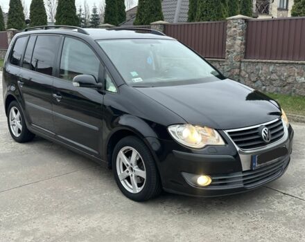 Черный Фольксваген Туран, объемом двигателя 1.9 л и пробегом 280 тыс. км за 4500 $, фото 1 на Automoto.ua