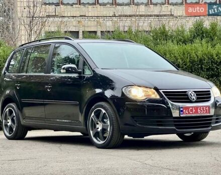 Чорний Фольксваген Туран, об'ємом двигуна 1.6 л та пробігом 221 тис. км за 7750 $, фото 1 на Automoto.ua