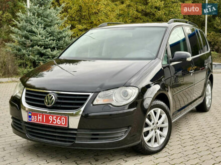 Фольксваген Туран 2008 у Могилев-Подольском на Automoto.ua Чорний Фольксваген Туран, об'ємом двигуна 1.6 л та пробігом 200 тис. км за 7950 $, фото 1 на Automoto.ua