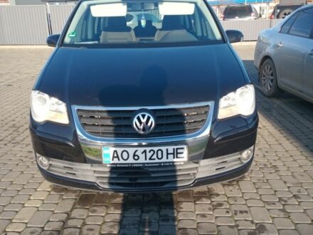 Черный Фольксваген Туран, объемом двигателя 1.4 л и пробегом 2 тыс. км за 6700 $, фото 1 на Automoto.ua