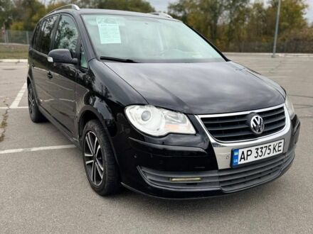 Фольксваген Туран 2008 в Запорожье на Automoto.ua Черный Фольксваген Туран, объемом двигателя 1.4 л и пробегом 211 тыс. км за 7100 $, фото 1 на Automoto.ua